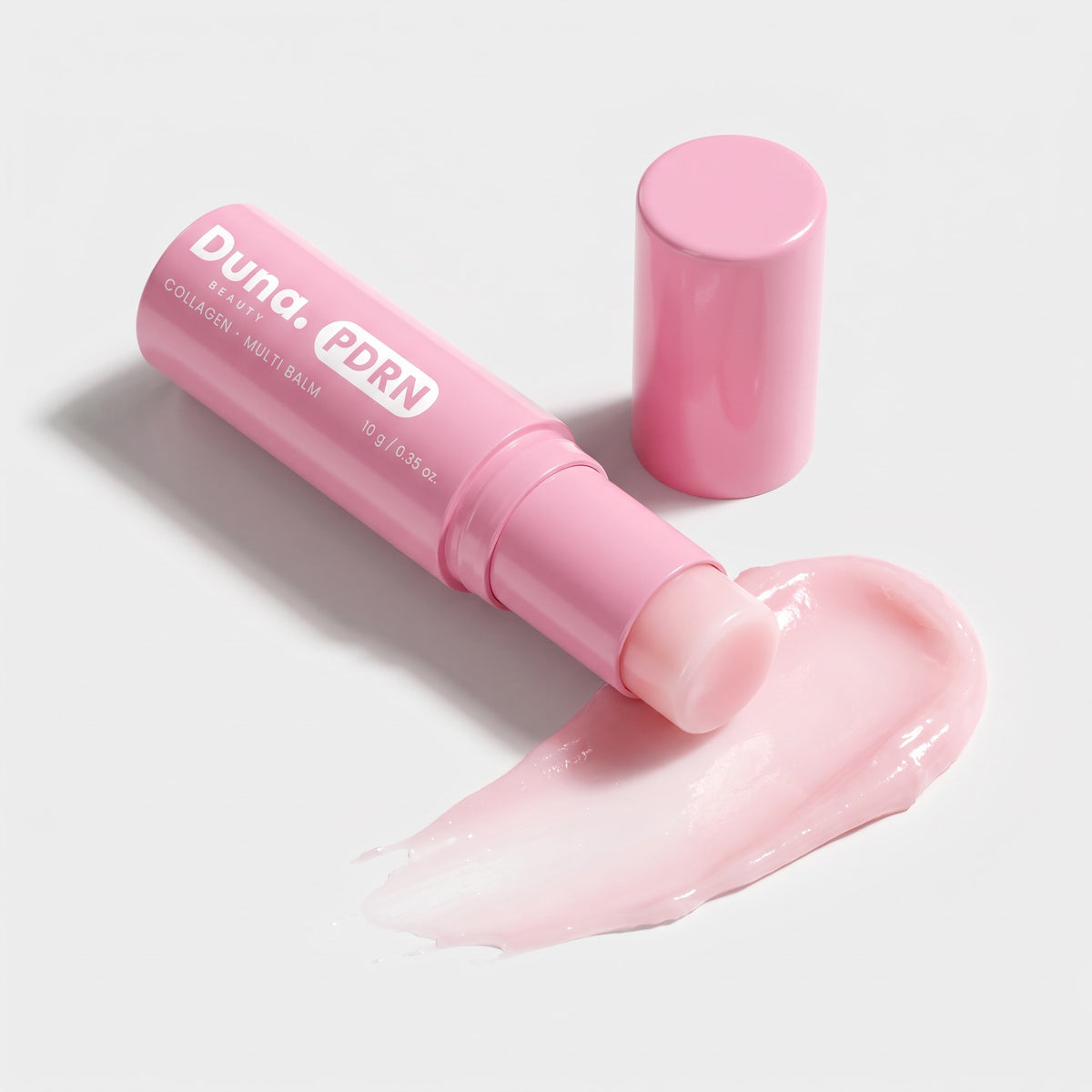 Duna Beauty PDRN Collagen Multi Balm stick with its pink balm texture swatch